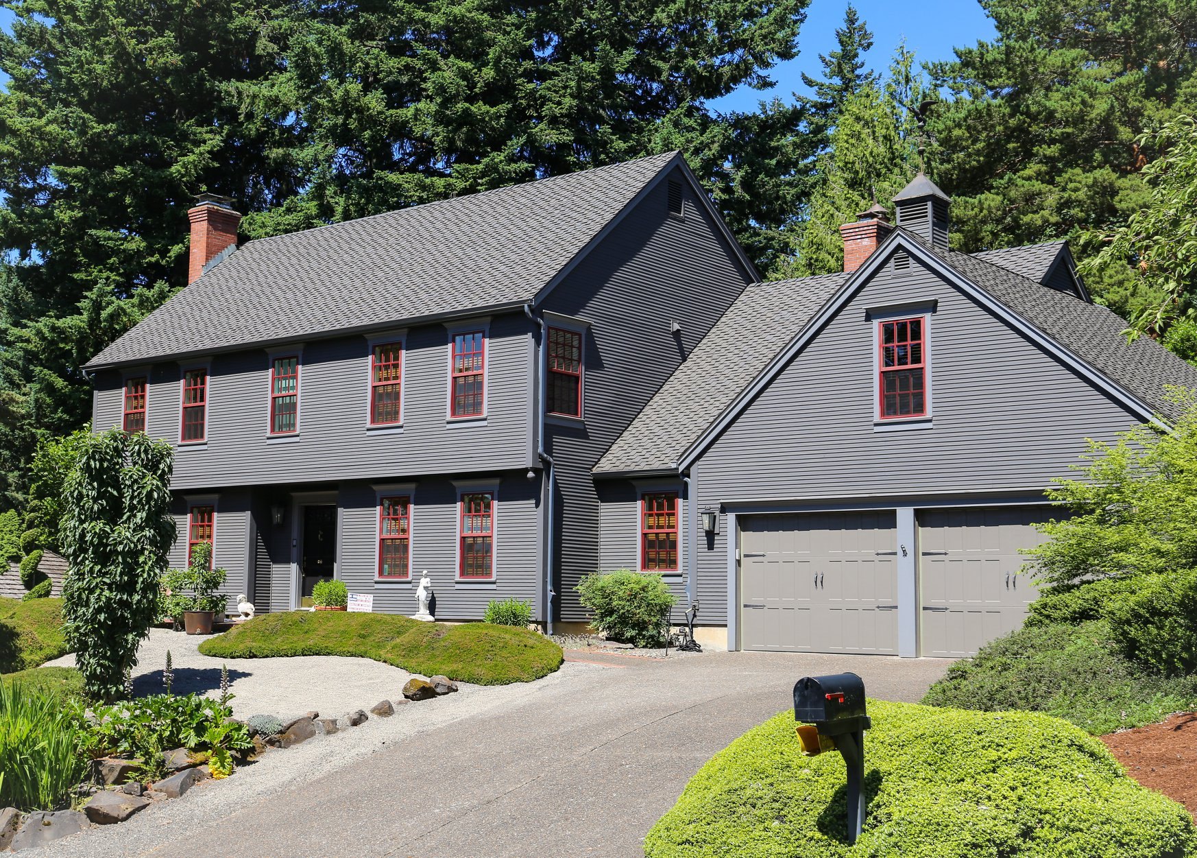 Gray home with cedar shingle gables and lap siding installed by LADA Exteriors in Portland
